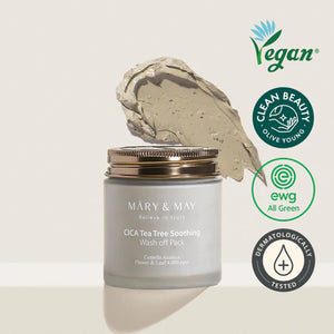 MARY & MAY CICA Tea Tree Soothing Wash Off Pack jar open with product smear, accompanied by vegan and dermatologically tested badges.