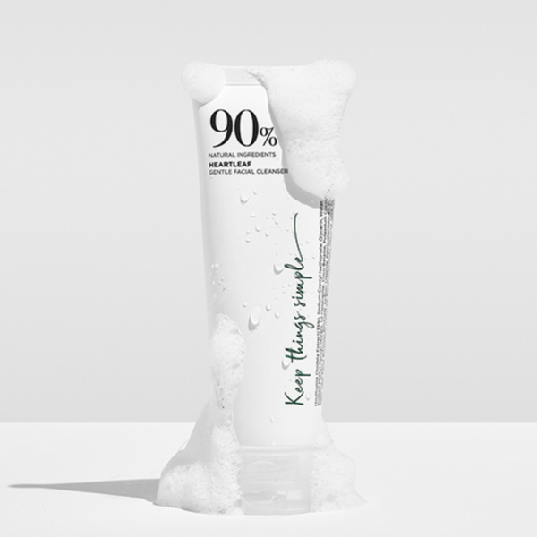 White tube of Anua heartleaf gentle foam cleanser covered in foam