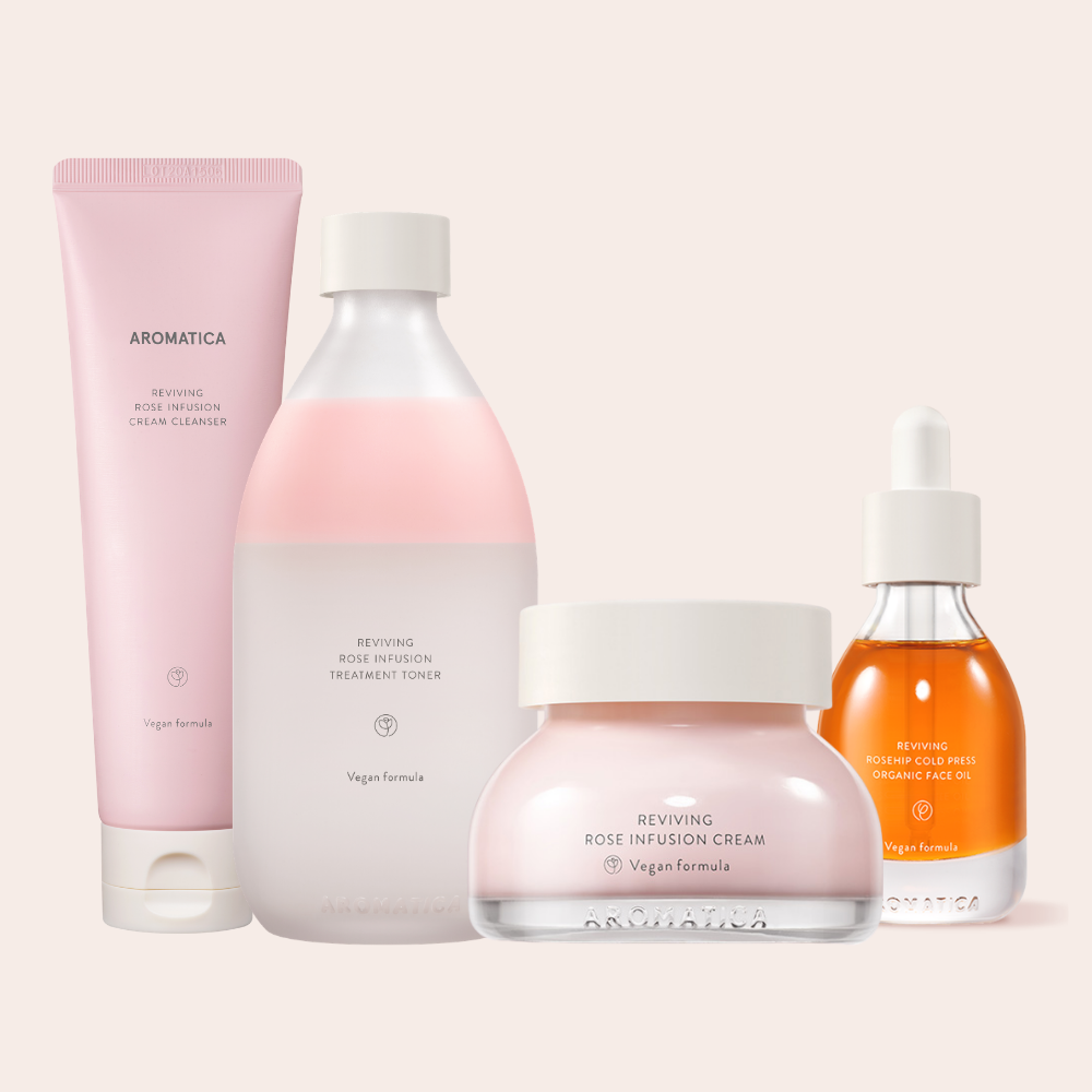 Aromatica's pink rose infusion line including cleanser, toner, oil, and cream