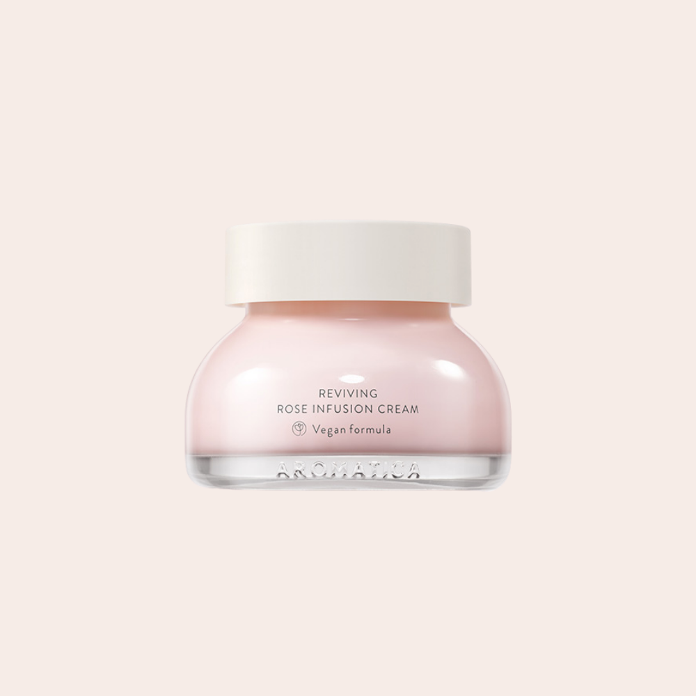 pink rose colored Aromatica Rose Infusion Cream in glass jar