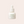 White bottle with dropper of kakadu youth glow vita c serum and ferulic acid