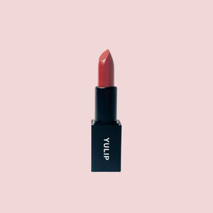 Yulip natural lipstick in a dried rose color in black tube 